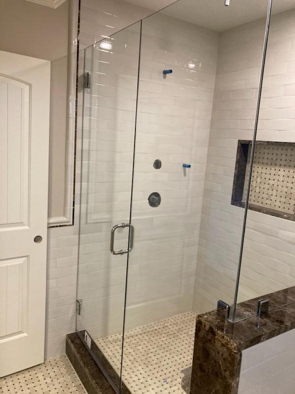 New Glass Shower Enclosure with Swing Glass door by: Area Glass Co. Milford, MA 01757